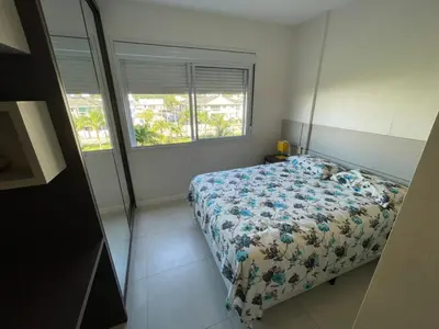 Uma cama ou camas num quarto em cód 56 - Apartamento á 300M do mar