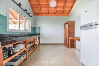 A cozinha ou kitchenette de Casa na beira da praia do Perequê SC AAF378