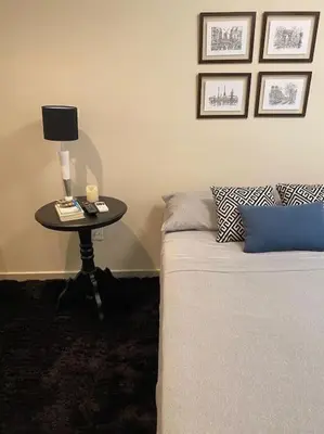 Uma cama ou camas num quarto em Apto Centro Bombinhas