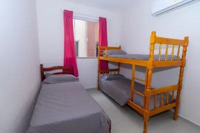 Uma cama ou camas num quarto em 050 - Apartamento 2 dorm para 6 pessoas em Bombas