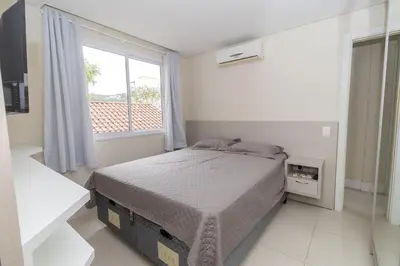 Uma cama ou camas num quarto em 173 - Apartamento 02 Dormitórios na praia de Bombas para 6 pessoas
