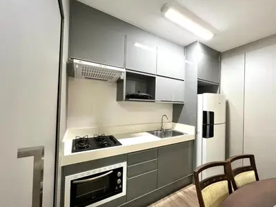 A cozinha ou kitchenette de Lindo! Apto com piscina na praia de Palmas! SV01H
