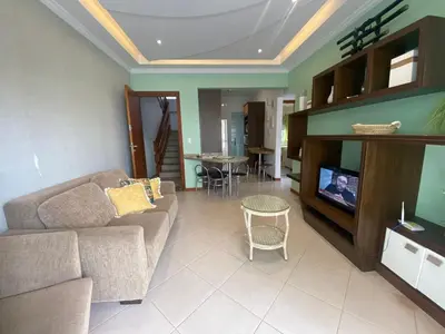 Uma televisão e/ou sistema de entretenimento em 318 - Apartamento 02 Dormitórios com Piscina