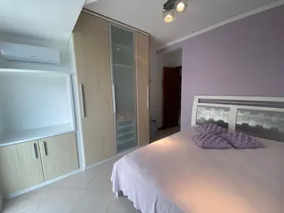 Uma cama ou camas num quarto em 318 - Apartamento 02 Dormitórios com Piscina