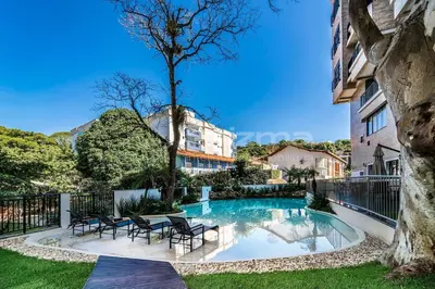 A piscina em ou perto de 504 Bl 02 - WaldGarten Bombinhas - 50 m do Mar e Frente Avenida - Condomínio de Alto Padrão - Piscina - Academia - Salão de jogos