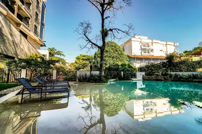 A piscina em ou perto de 504 Bl 02 - WaldGarten Bombinhas - 50 m do Mar e Frente Avenida - Condomínio de Alto Padrão - Piscina - Academia - Salão de jogos