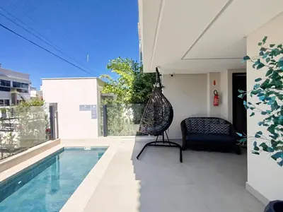 A piscina em ou perto de AR-302 Dpto 3 dormitorios a 150m de la playa