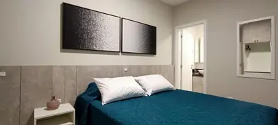 Uma cama ou camas num quarto em AR-302 Dpto 3 dormitorios a 150m de la playa