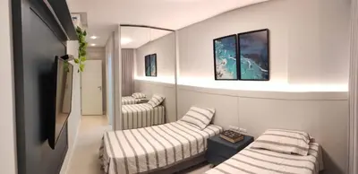 Uma cama ou camas num quarto em IMPRESSIONANTE DUPLEX PRÓXIMO AO MAR, 3 SUÍTES, Apt 407