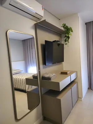 Uma cama ou camas num quarto em INCRÍVEL DUPLEX COM JACUZZI PRÓXIMO AO MAR, 3 SUÍTES, Apt 408