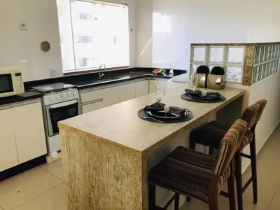 A cozinha ou kitchenette de Apartamento Praia de Porto Belo, Balneario Pereque, SC