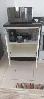 A cozinha ou kitchenette de Apartamento Praia de Porto Belo, Balneario Pereque, SC