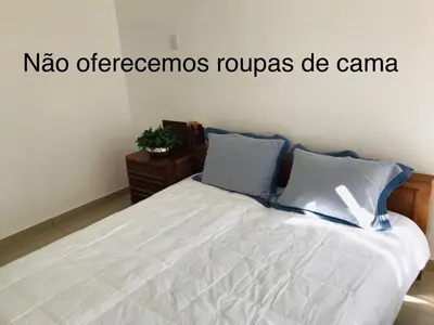 Uma cama ou camas num quarto em Apartamento Praia de Porto Belo, Balneario Pereque, SC