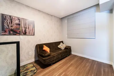 Uma área de estar em Duplex Alto Padrao 80 metros Mar Canto Grande SC