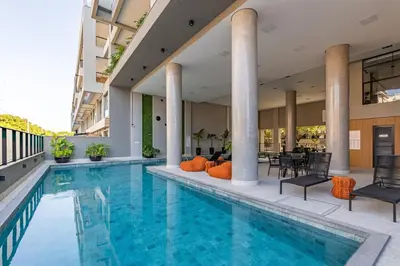 A piscina em ou perto de Duplex Alto Padrao 80 metros Mar Canto Grande SC