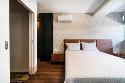 Uma cama ou camas num quarto em Duplex Alto Padrao 80 metros Mar Canto Grande SC