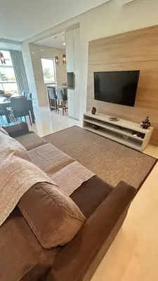 Uma televisão e/ou sistema de entretenimento em ANSNEGOCIOS APTO 3 SUÍTES PRAIA MARISCAL 201 Bayside