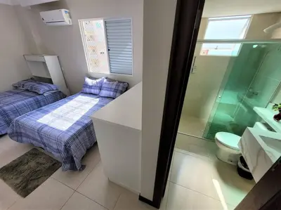 Uma casa de banho em 3 suítes grandes, 4 garagens, Vista mar, ótima localização a 2 minutos do mar em Meia Praia - Itapema
