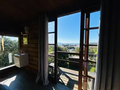 Uma varanda ou terraço em Praia de Palmas- Suíte 02