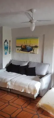 Uma cama ou camas num quarto em Bombinhas