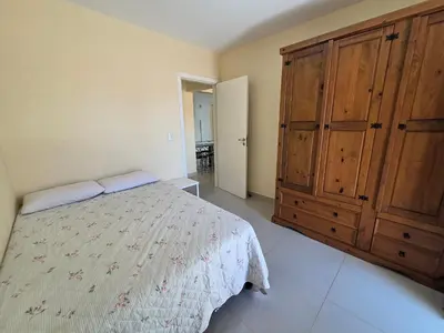 Uma cama ou camas num quarto em Res Mariscal em Bombinhas