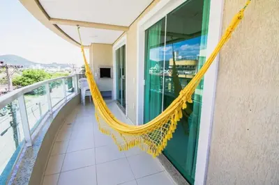 Uma varanda ou terraço em 201- Apartamento Bombas com vista lateral do mar