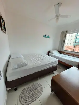 Uma cama ou camas num quarto em 201- Apartamento Bombas com vista lateral do mar