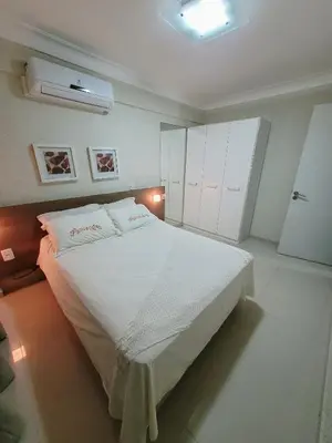 Uma cama ou camas num quarto em Apartamento Summer Beach Bombas