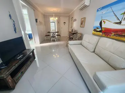 Uma televisão e/ou sistema de entretenimento em Apartamento Bombinhas Centro