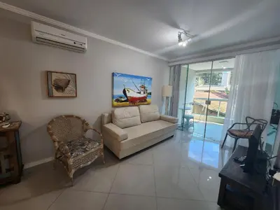 Uma área de estar em Apartamento Bombinhas Centro