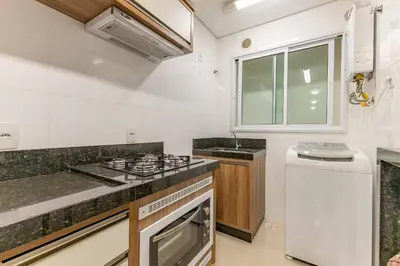 A cozinha ou kitchenette de Apartamento com Excelente Localização na Praia de Bombinhas