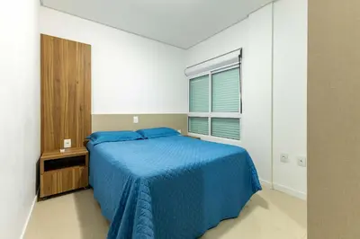 Uma cama ou camas num quarto em Apartamento com Excelente Localização na Praia de Bombinhas