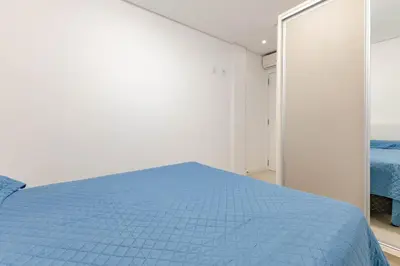 Uma cama ou camas num quarto em Excelente Localização a 290m da Praia de Bombinhas
