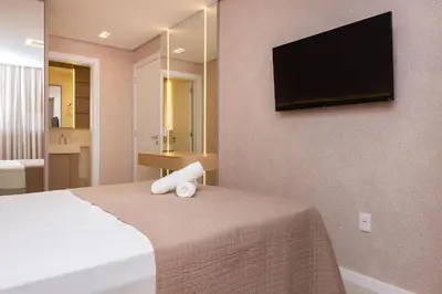 A planta de Caraíbas 201 – Lindíssimo Apartamento em Canto Grande, a 120 Metros do Mar - Piscina térreo.