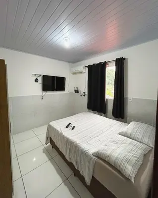 Uma cama ou camas num quarto em AP número 3
