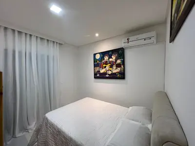 Uma cama ou camas num quarto em RECANTO RESIDENCIAL MARISCAL APT03