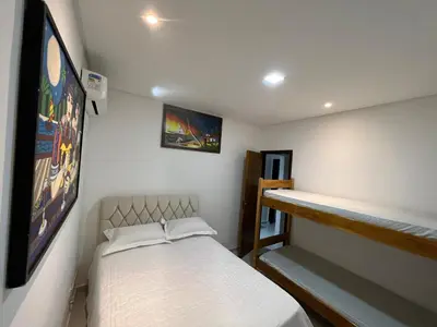 Uma cama ou camas num quarto em RECANTO RESIDENCIAL MARISCAL APT03