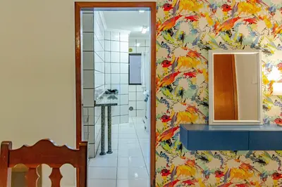 Uma casa de banho em Com garagem a 2 quadras do mar MM9040