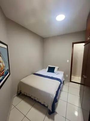 Uma cama ou camas num quarto em Vista mar e próximo ao pier - Apto a 60m do mar