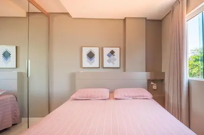 Uma cama ou camas num quarto em Cobertura 03 suítes, piscina privativa e vista mar