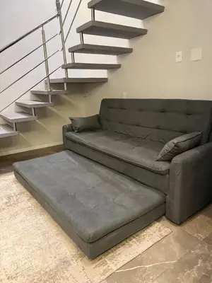 Uma área de estar em Loft proximo a diversas praias