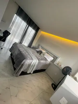 Uma cama ou camas num quarto em Loft proximo a diversas praias