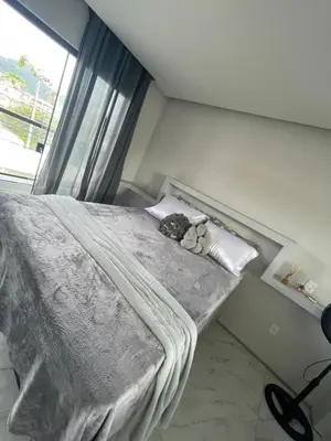 Uma cama ou camas num quarto em Loft proximo a diversas praias