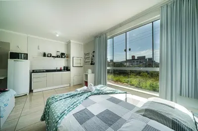 A cozinha ou kitchenette de Residencial Florida II 150 mts do Mar