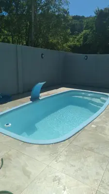 A planta de Casa agradável com piscina e churrasqueira