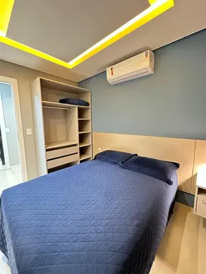 Uma cama ou camas num quarto em Cobertura Bombinhas Vista Panoramica do Mar na Aluguejaah