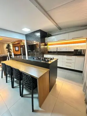 A cozinha ou kitchenette de Cobertura Bombinhas Vista Panoramica do Mar na Aluguejaah