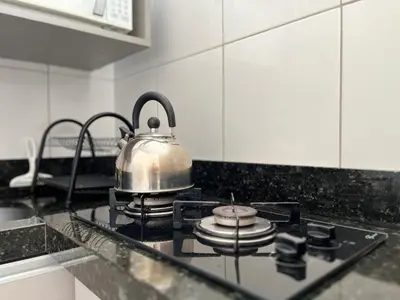A cozinha ou kitchenette de Apartamento dos Sonhos - Studio em Prédio a Beira Mar