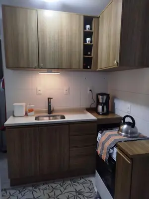 A cozinha ou kitchenette de Apartamento em palmas gov celso ramos 70 m do mar