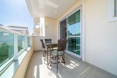 Uma varanda ou terraço em Edifício Costa Mexicana a 50 metros do Mar de Canto Grande